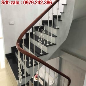 Báo giá cầu thang sắt nghệ thuật tay vịn gỗ