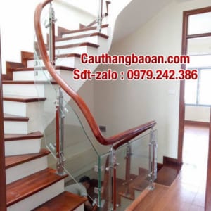 Cầu thang lan can kính tay vịn gỗ, cầu thang kính đẹp