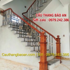 Cầu thang sắt tay vịn gỗ , Cầu thang lan can sắt mỹ thuật tại Hà Nội