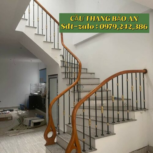 CẦU THANG SẮT TAY VỊN GỖ ĐẸP . MẪU CẦU THANG SẮT NGHỆ THUẬT TẠI HÀ NỘI