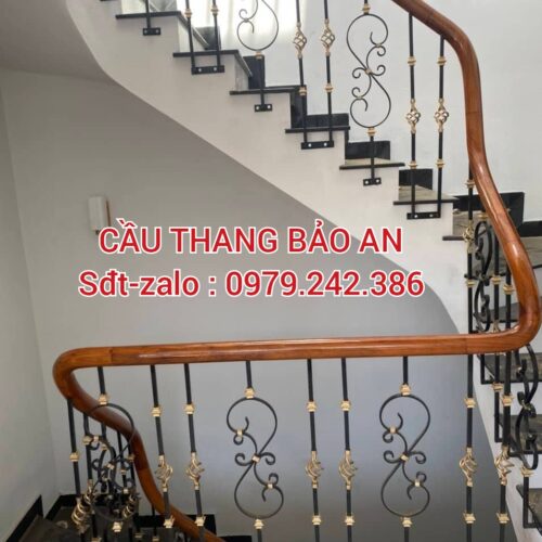 CẦU THANG SẮT ĐẸP NGHỆ THUẬT . LAN CAN CẦU THANG SẮT ĐẸP TAY VỊN GỖ